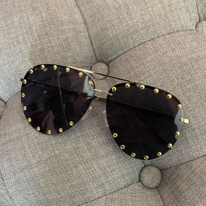 Gold studded sunglasses